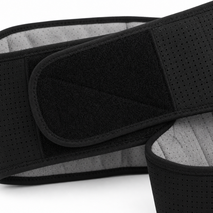 Close-up detail of the DriveOn CoreRelief belt closure flap, showing the mesh outer shell and grey inner lining