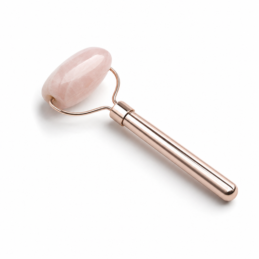 Glow Facial Massage Tool shown at an angle on a plain white surface, a manual roller with a stone head and slim handle
